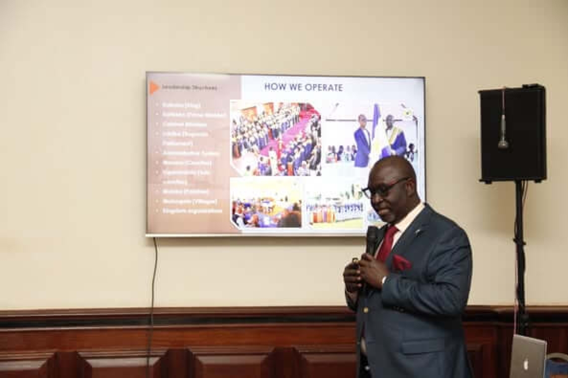 Hon. Robert Waggwa Nsibirwa shares insights on Buganda's traditional leadership with guests from the Rwenzururu Businga